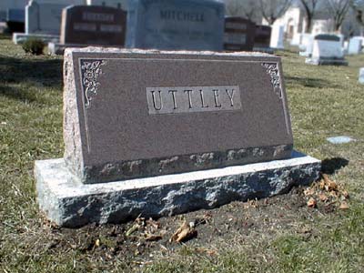 [Family headstone]